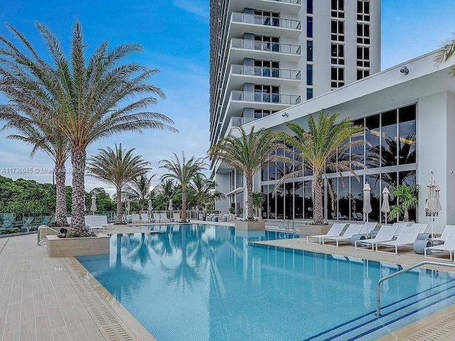 pool featuring a patio area