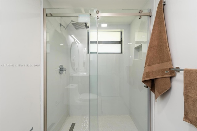 full bathroom with a stall shower