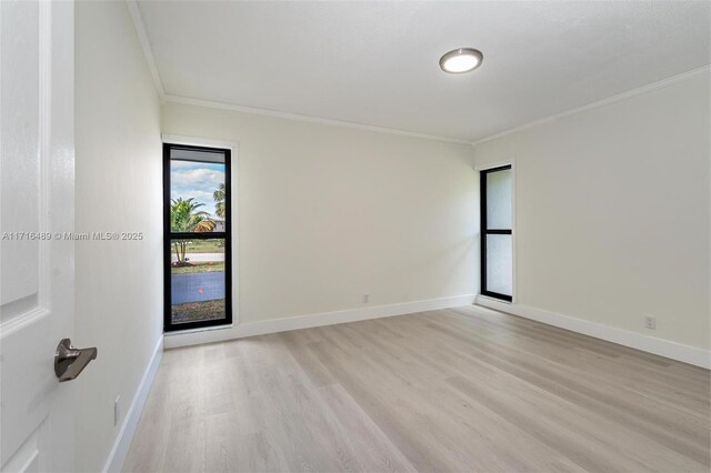 kitchen featuring a wealth of natural light, white cabinetry, sink, stainless steel appliances, and french doors