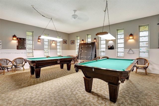 game room featuring billiards, carpet floors, and a textured ceiling