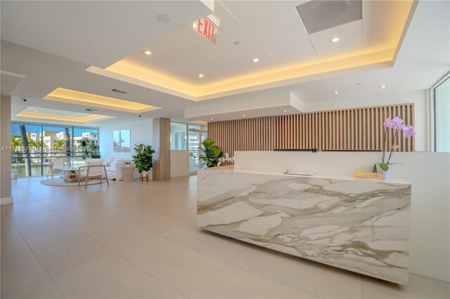 kitchen with gray cabinetry, decorative backsplash, and stainless steel appliances