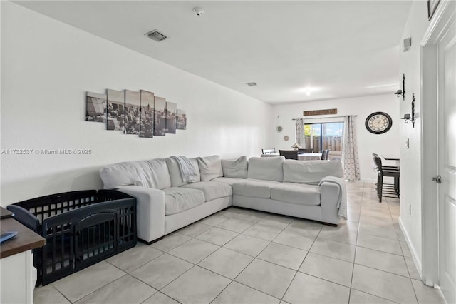 living room featuring light tile patterned flooring