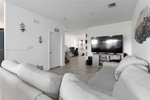 living room with light tile patterned floors