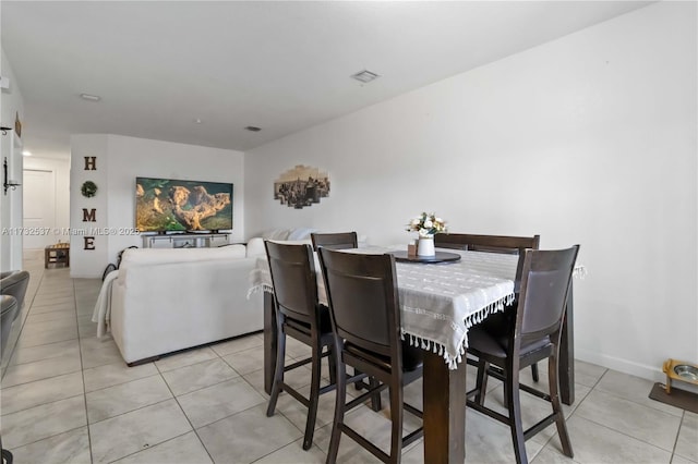 view of tiled dining space