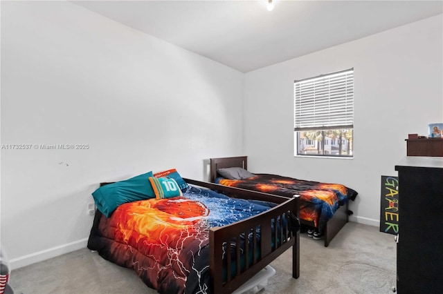 bedroom with light carpet