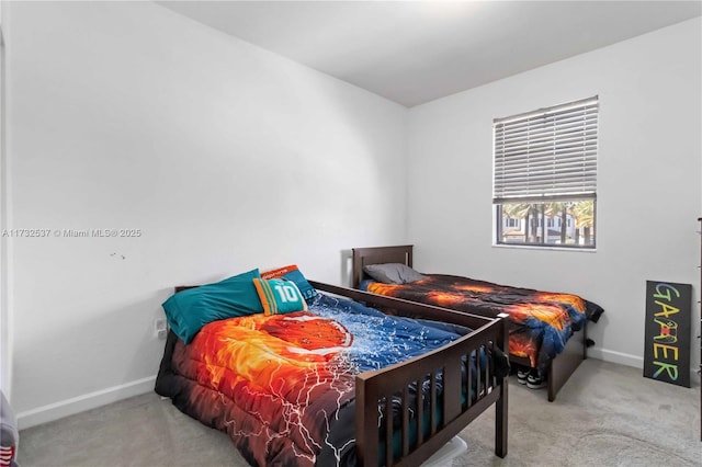 bedroom featuring light carpet