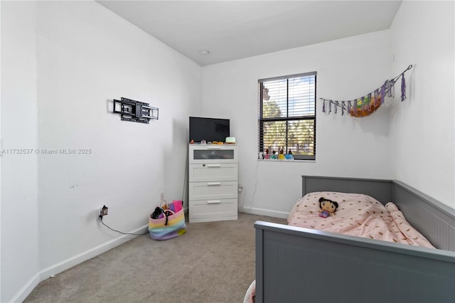 bedroom featuring carpet