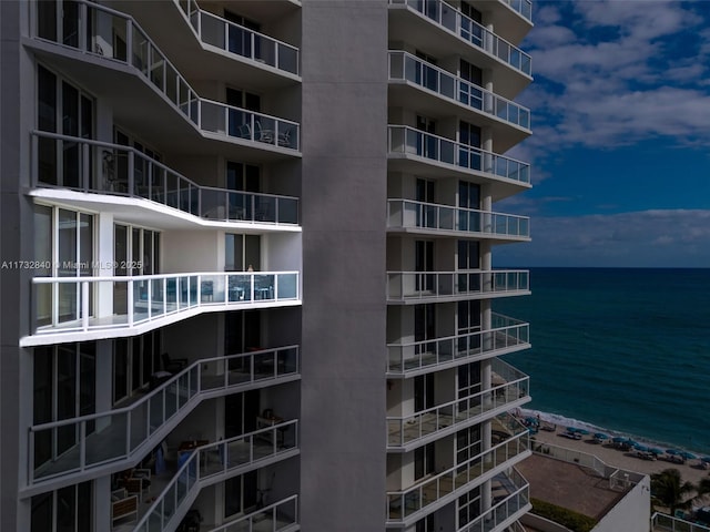 view of property with a water view