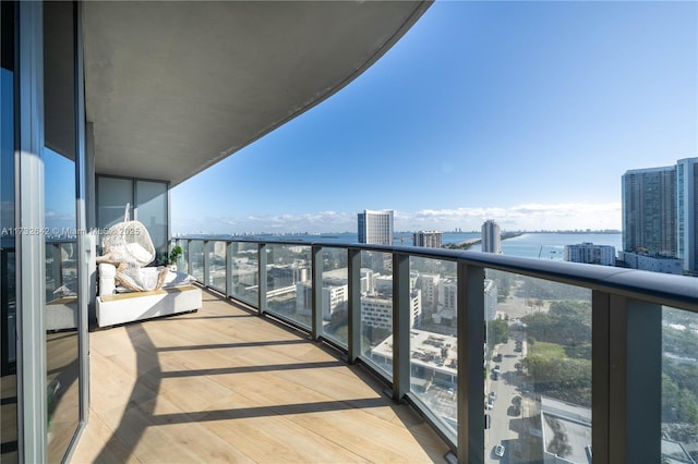 balcony featuring a water view