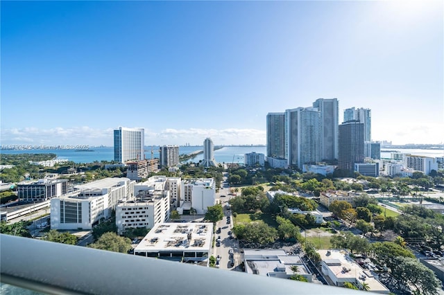 property's view of city with a water view