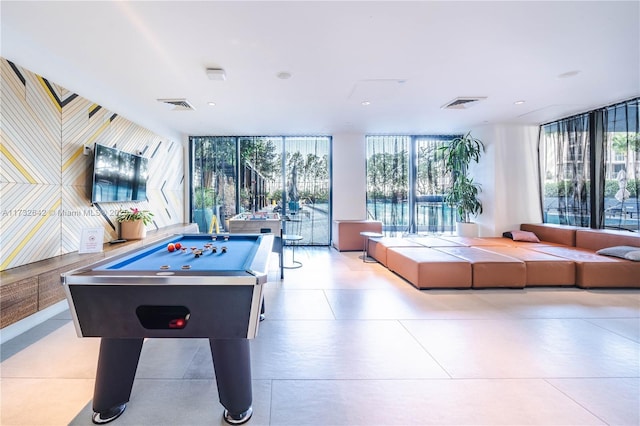 rec room featuring billiards, floor to ceiling windows, and a wealth of natural light