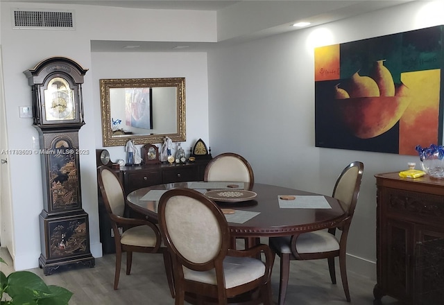 dining space featuring light hardwood / wood-style flooring