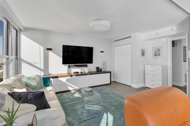 living room with light tile patterned floors