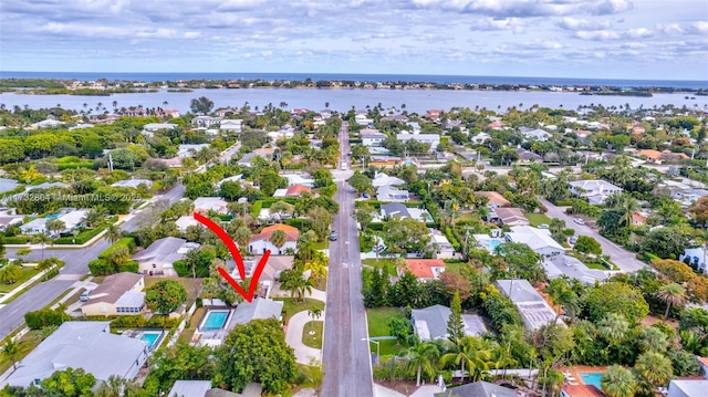 drone / aerial view featuring a water view