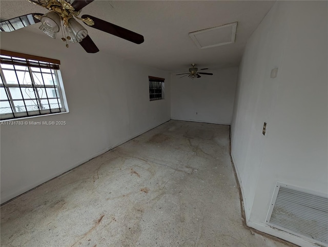 empty room featuring ceiling fan