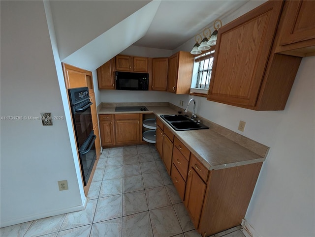 kitchen featuring lofted ceiling, sink, and black appliances