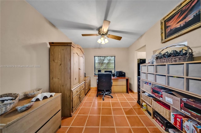 office with ceiling fan and light tile patterned flooring