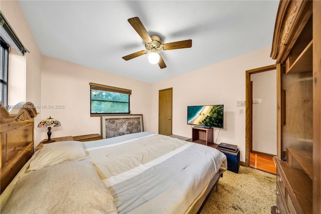 bedroom featuring ceiling fan and carpet flooring