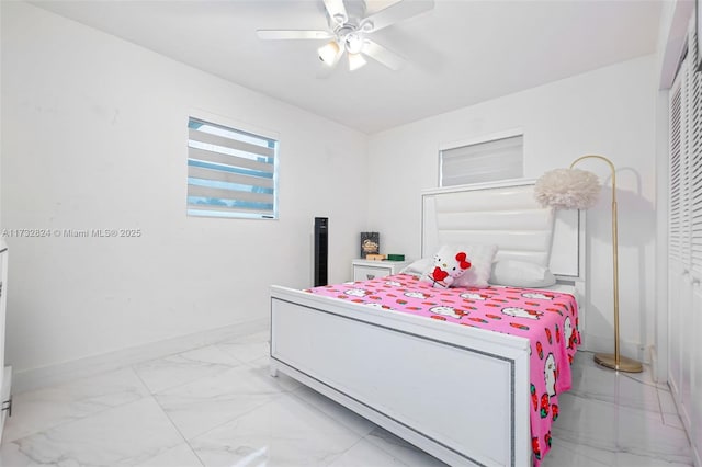 bedroom with a closet and ceiling fan