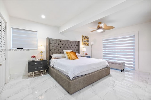 bedroom featuring ceiling fan