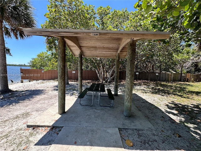 view of patio featuring a water view