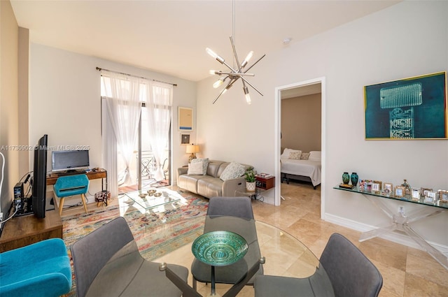 living room with a notable chandelier