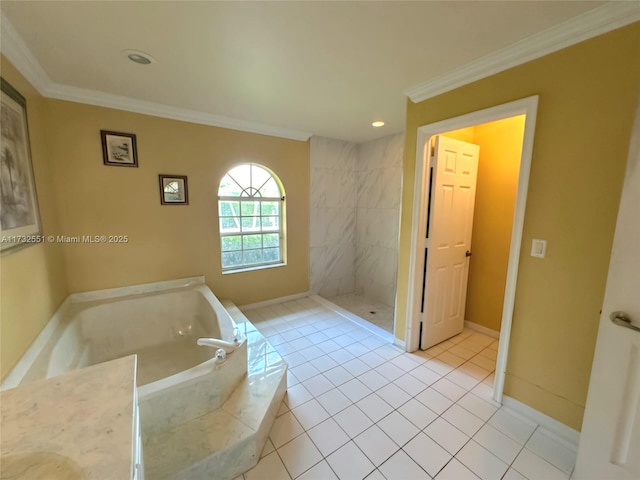 bathroom featuring baseboards, tile patterned flooring, a garden tub, and crown molding