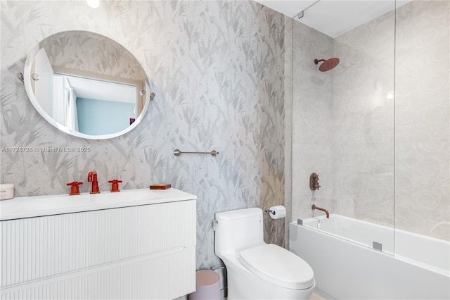 full bathroom featuring shower / bathing tub combination, vanity, and toilet