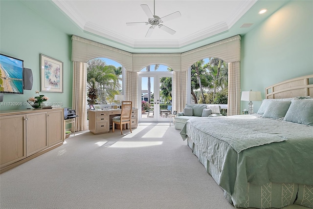 carpeted bedroom with french doors, ceiling fan, access to exterior, and a raised ceiling