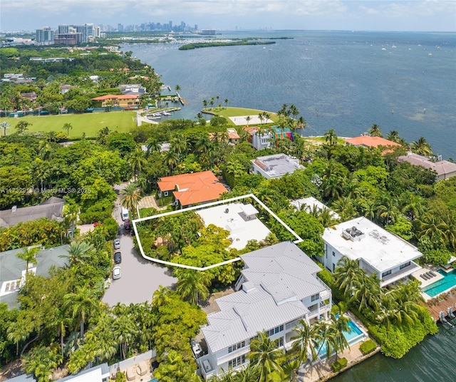 birds eye view of property featuring a water view