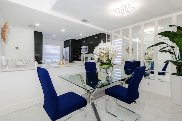 dining area featuring sink