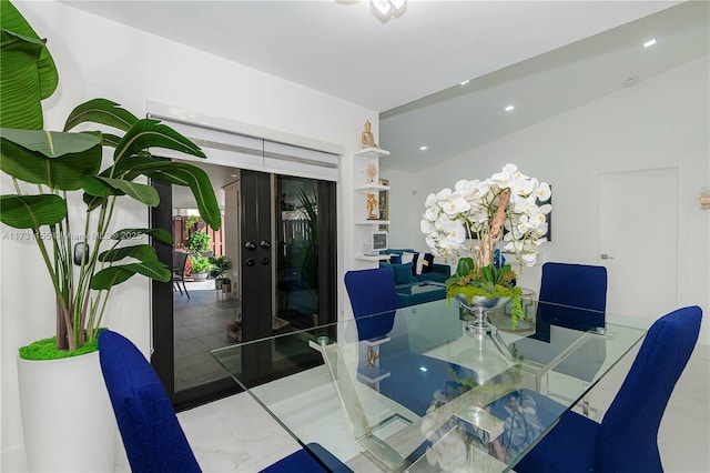 dining space featuring french doors