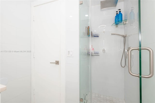 bathroom with an enclosed shower