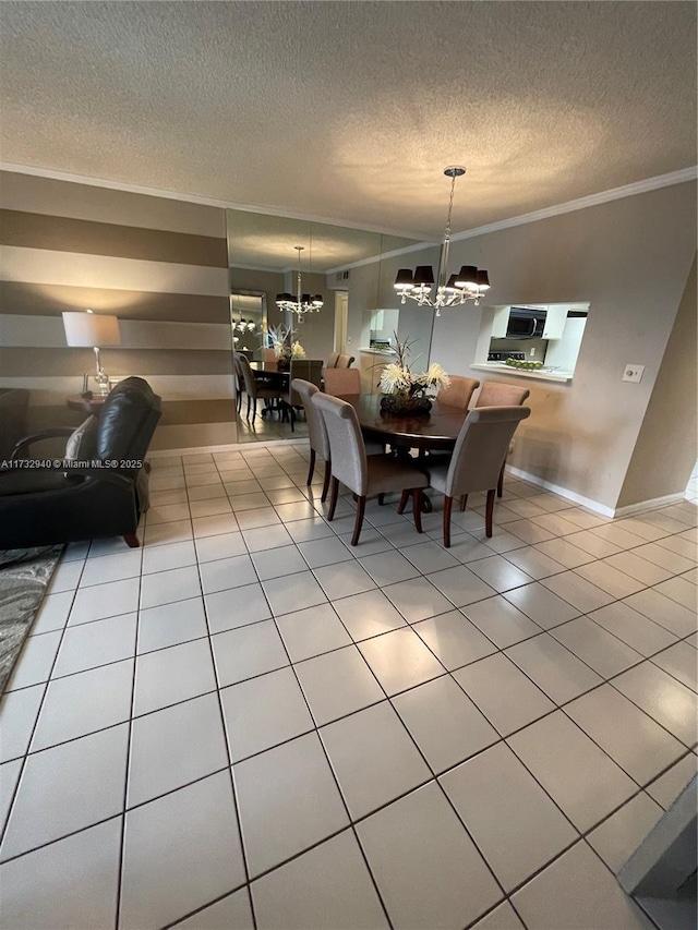 dining room with crown molding, light tile patterned floors, a textured ceiling, and a chandelier