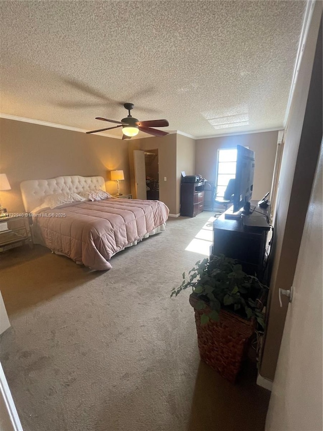 bedroom with ornamental molding, light carpet, a textured ceiling, and ceiling fan