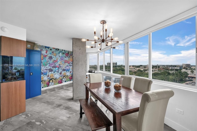 dining area with a notable chandelier