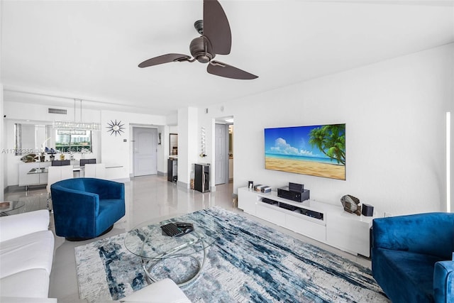 living room featuring ceiling fan