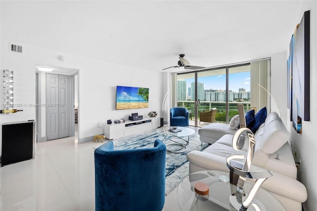 3675 N Country Club Dr Unit 1006, Aventura, FL 33180 - living area featuring ceiling fan, expansive windows, and tile patterned flooring