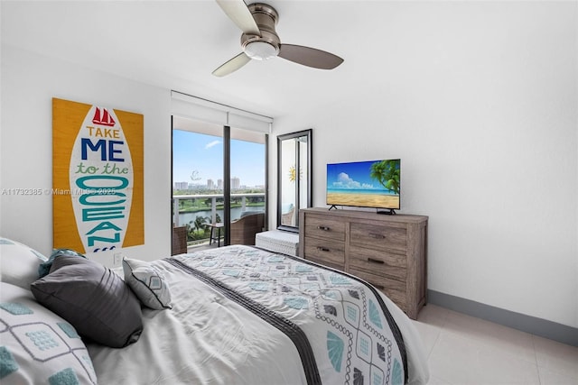 tiled bedroom featuring access to outside and ceiling fan