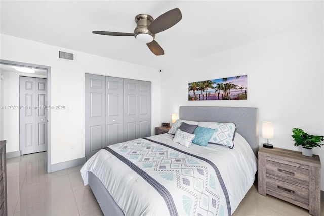 3675 N Country Club Dr Unit 1006, Aventura, FL 33180 - bedroom with a closet, light tile patterned flooring, and a ceiling fan