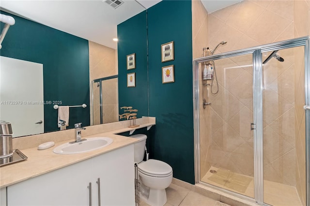 bathroom with walk in shower, tile patterned floors, toilet, and vanity