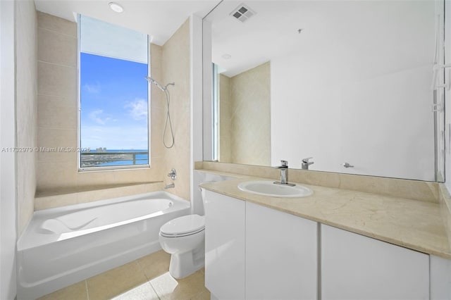 bathroom with tile patterned flooring, visible vents, toilet, vanity, and shower / bathing tub combination