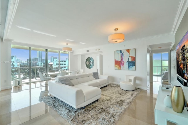 living room featuring ornamental molding, a wealth of natural light, a wall of windows, and light tile patterned floors