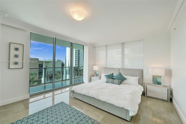 bedroom featuring floor to ceiling windows and ornamental molding