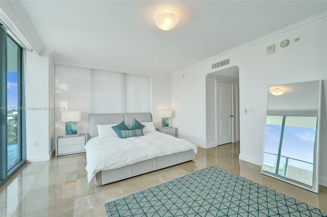 bedroom featuring crown molding