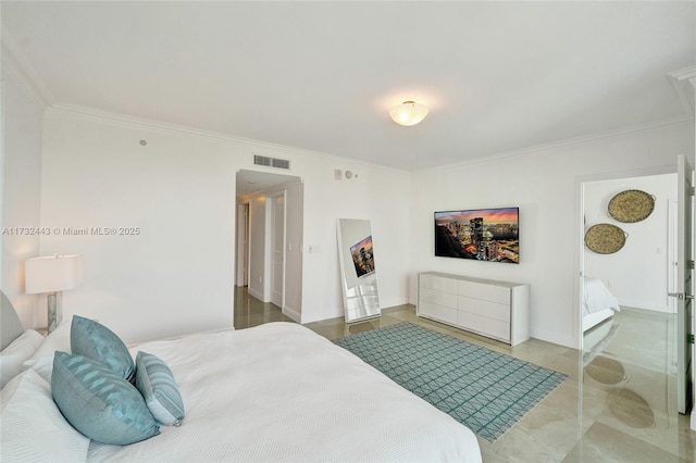 bedroom with crown molding