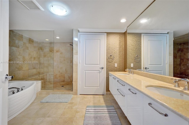 bathroom with tile walls, vanity, separate shower and tub, crown molding, and tile patterned floors