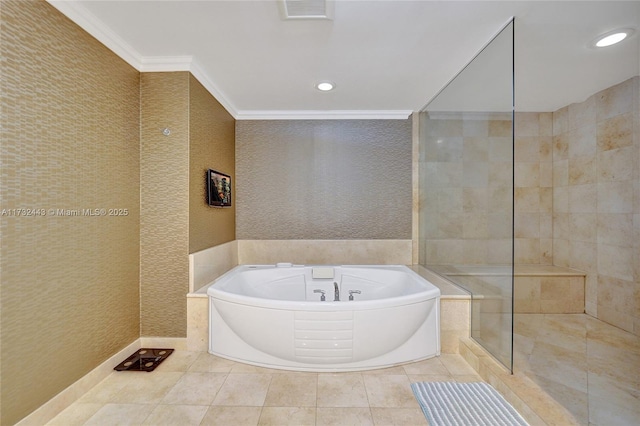 bathroom featuring ornamental molding, tile patterned flooring, and tiled tub