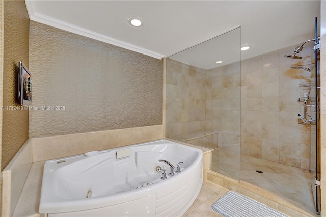 bathroom featuring crown molding, tile patterned floors, separate shower and tub, and tile walls