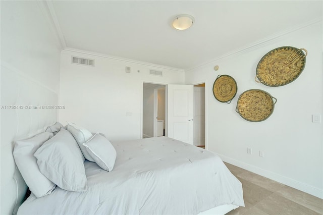 bedroom with ornamental molding